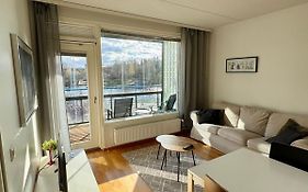 Kotimaailma Apartments - saunallinen kaksio koskinäkymällä - Verstaankatu